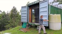 Aussie couple builds off-grid mobile home with 2 containers