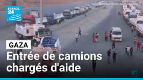 Entrée de camions chargés d'aide humanitaire dans la bande de Gaza • FRANCE 24